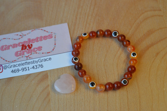 Fire Agate & Evil Eye Bracelet – Protection, Confidence & Bold Solar Energy