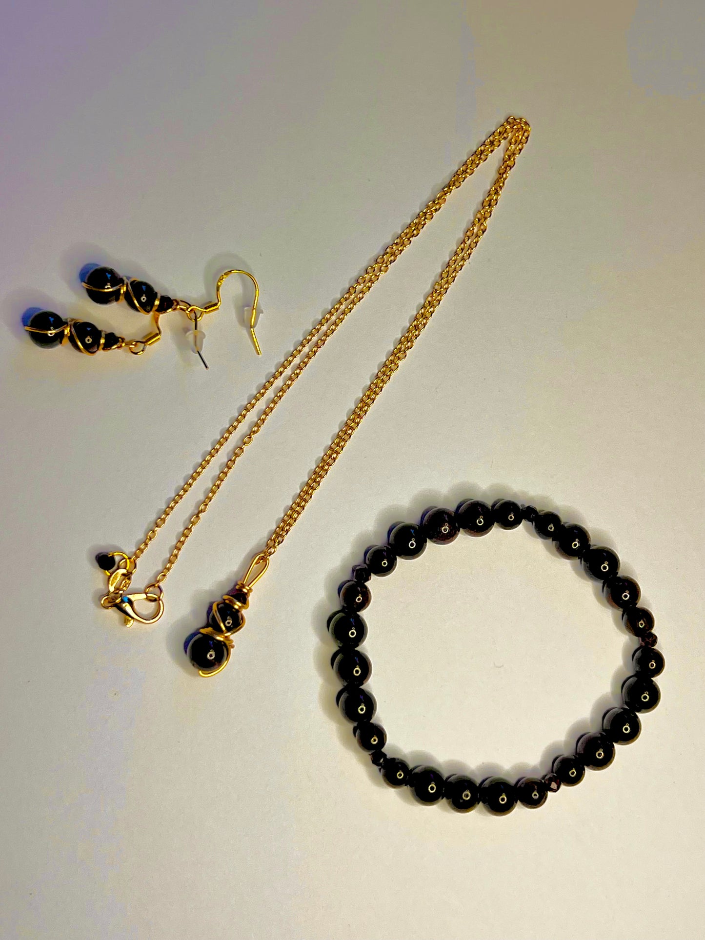 Garnet Radiance — Gold-Plated Garnet Set (Earrings, Necklace & Bracelet)