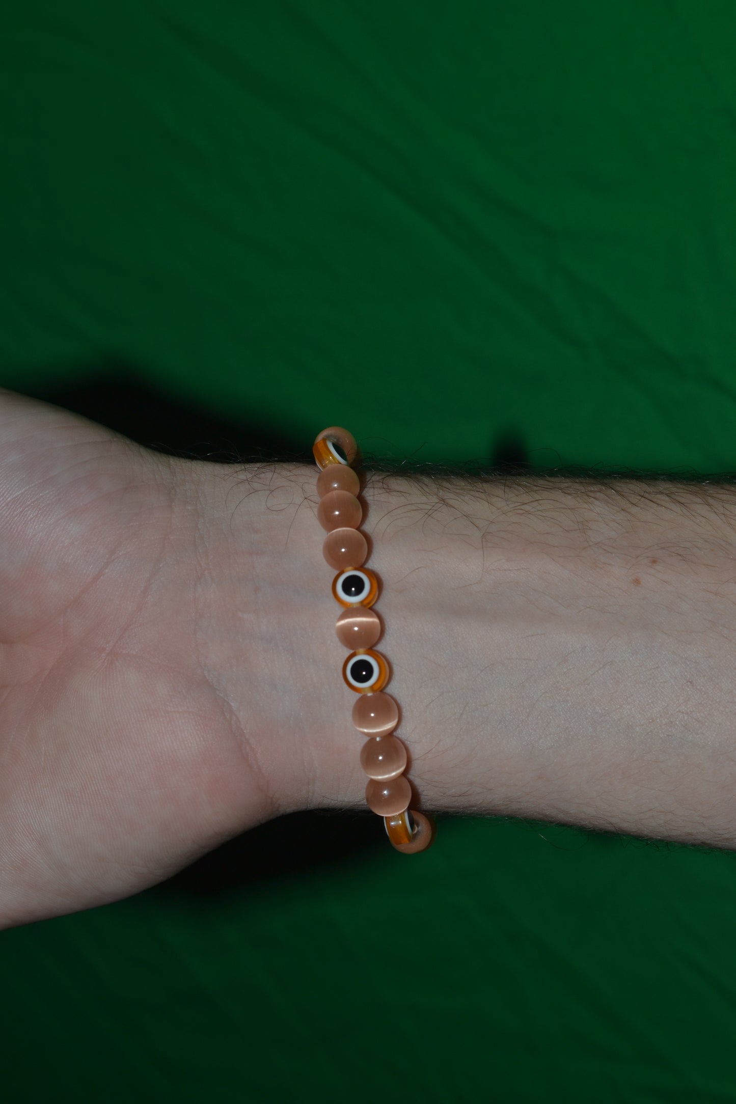 Light Orange Cat’s Eye & Evil Eye Bracelet – Soft Power & Spiritual Protection