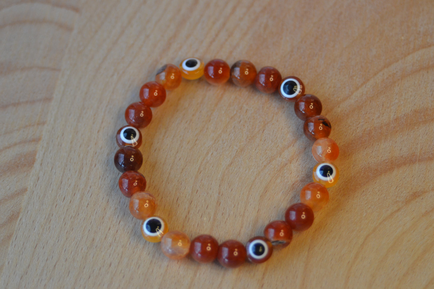 Fire Agate & Evil Eye Bracelet – Protection, Confidence & Bold Solar Energy