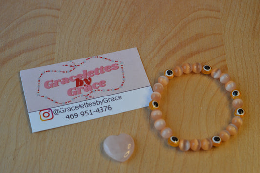 Light Orange Cat’s Eye & Evil Eye Bracelet – Soft Power & Spiritual Protection
