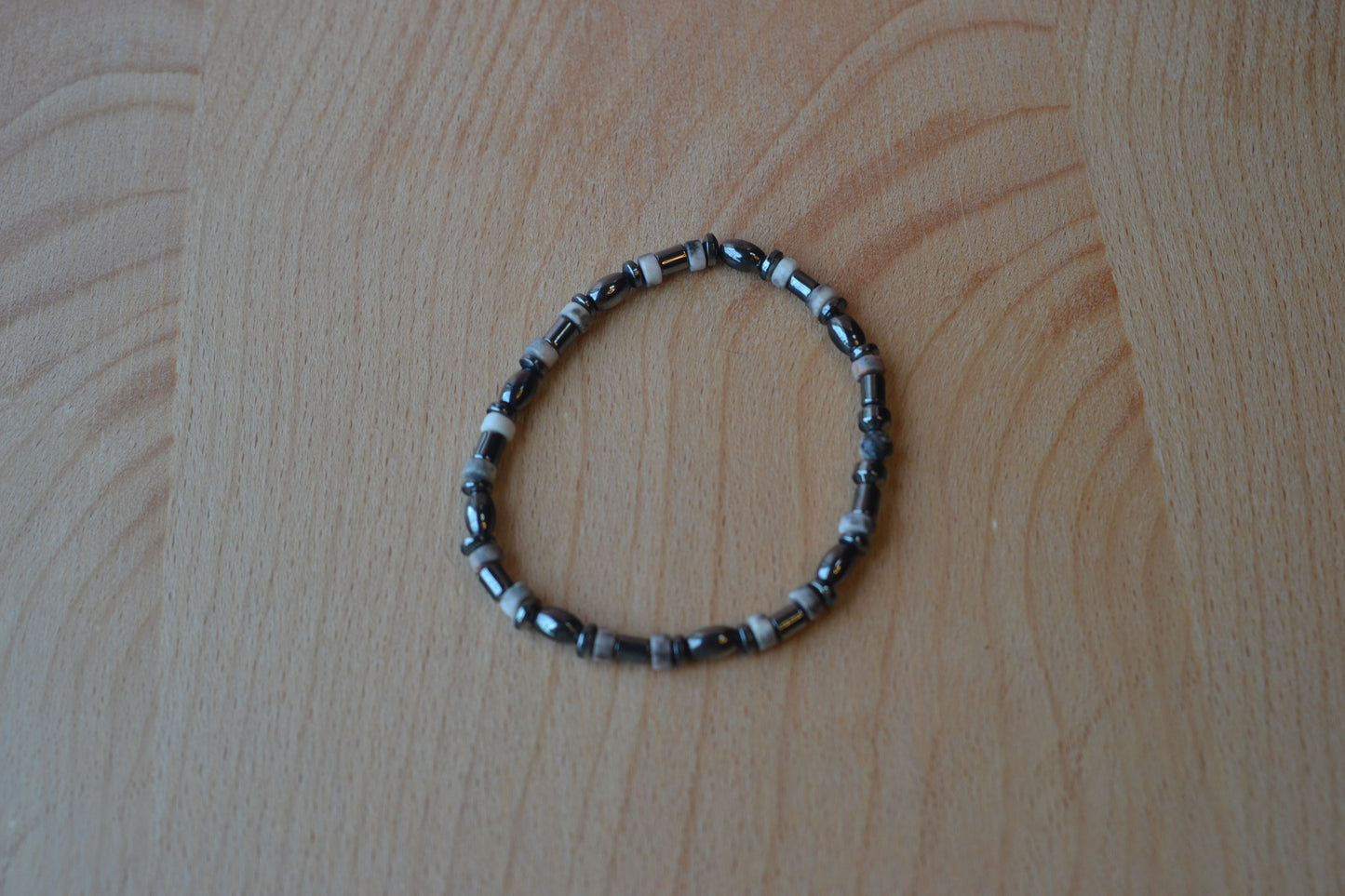 Hematite & Rhodonite Bracelet – Grounded Heart & Steady Strength (2mm)