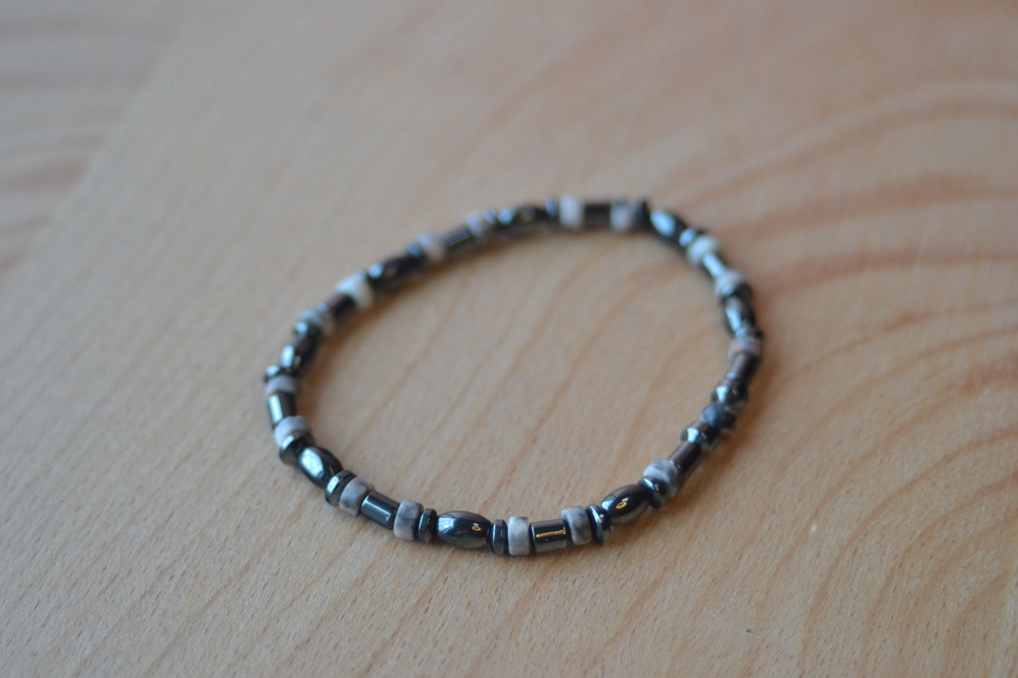 Hematite & Rhodonite Bracelet – Grounded Heart & Steady Strength (2mm)